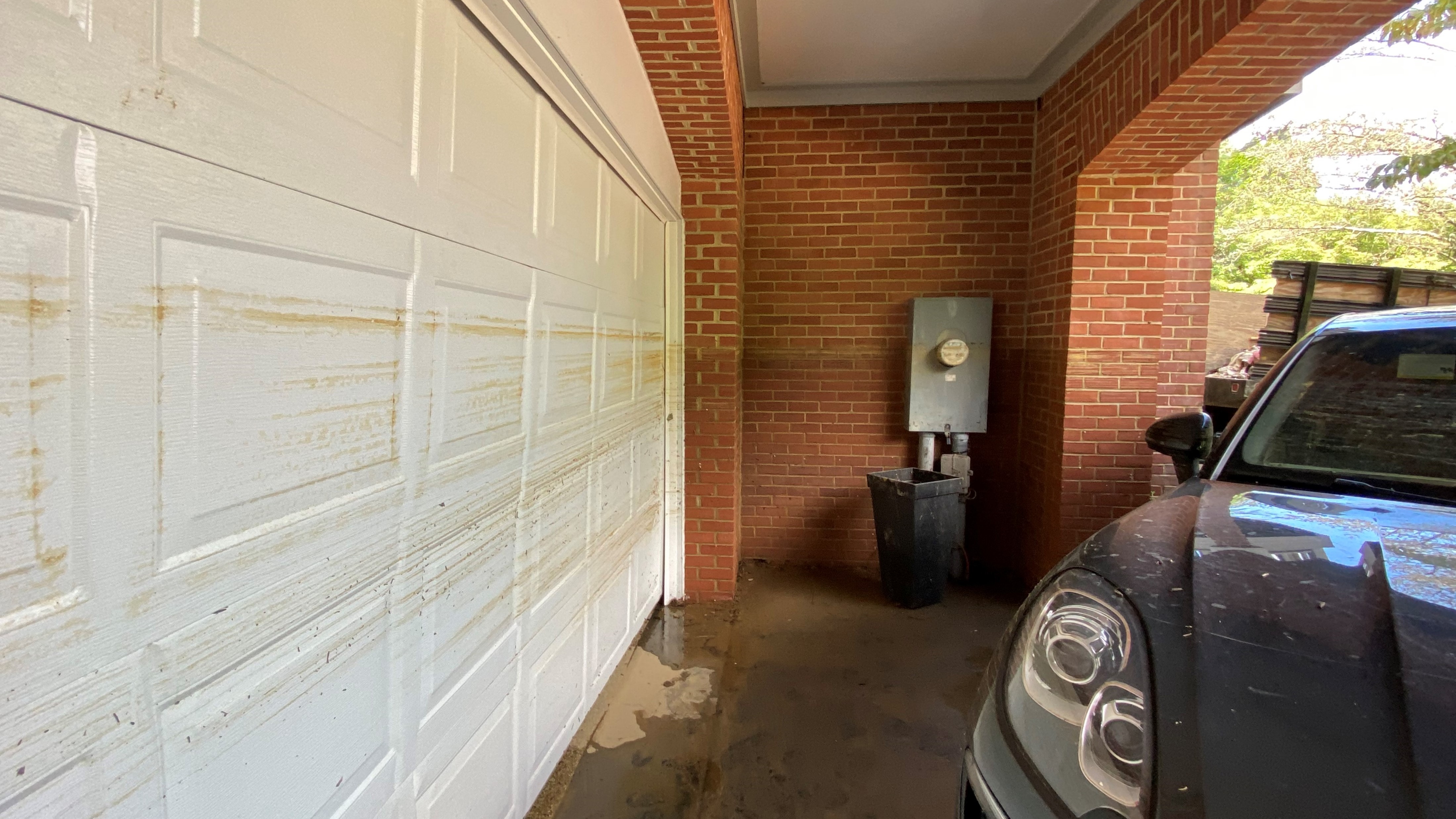 Waterline on a garage door from a flood.